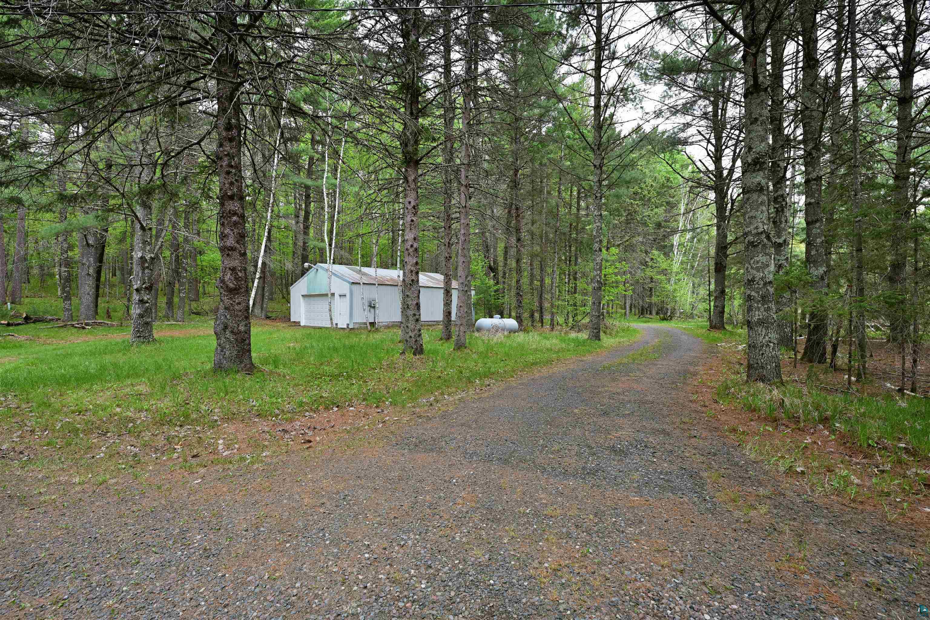 2775 Lake Road Barnes, WI 54873 - Photo 17 of 52 View of dirt / gravel road with a view of trees