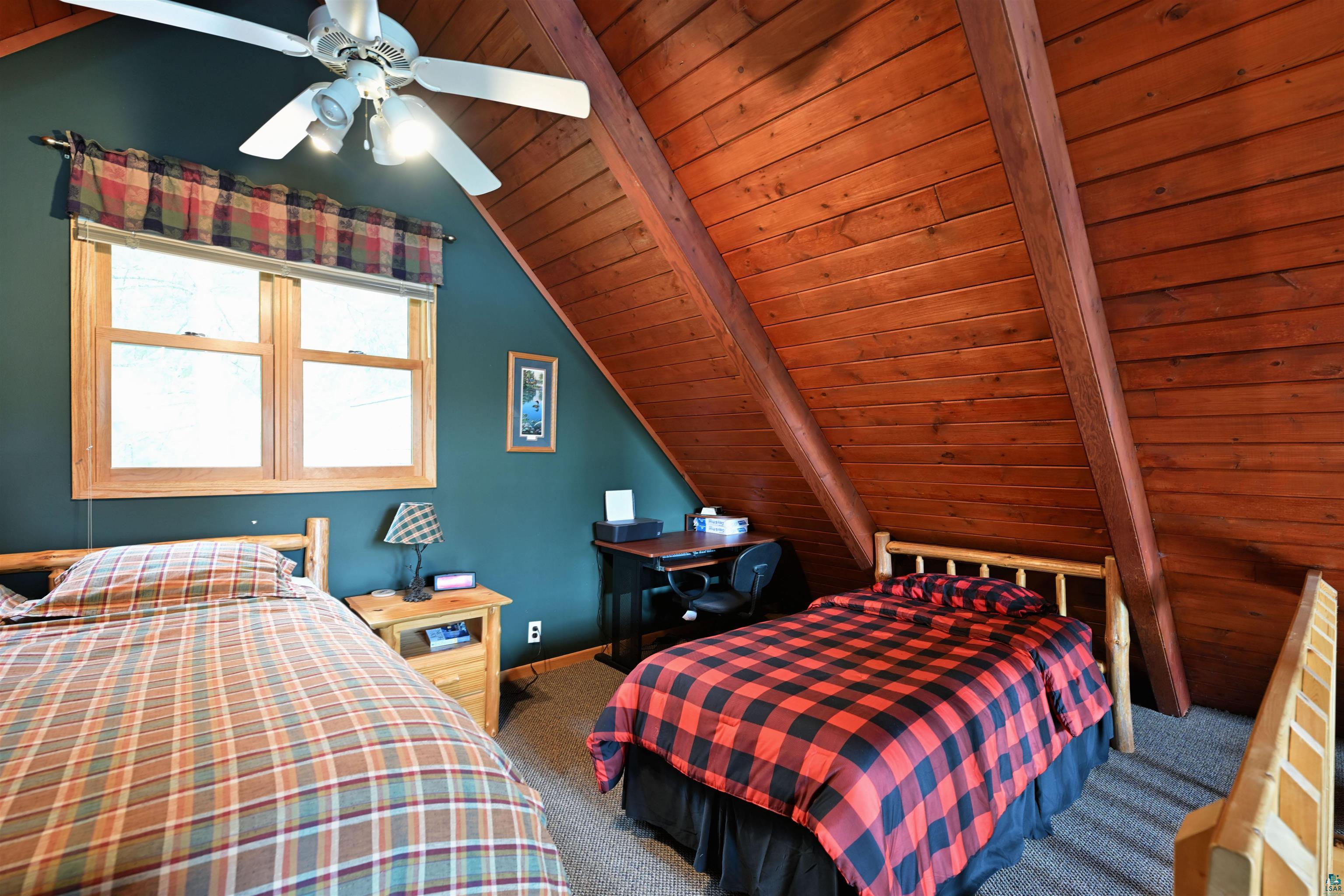 2775 Lake Road Barnes, WI 54873 - Photo 48 of 52 Bedroom with wooden ceiling, carpet, vaulted ceiling with beams, and ceiling fan