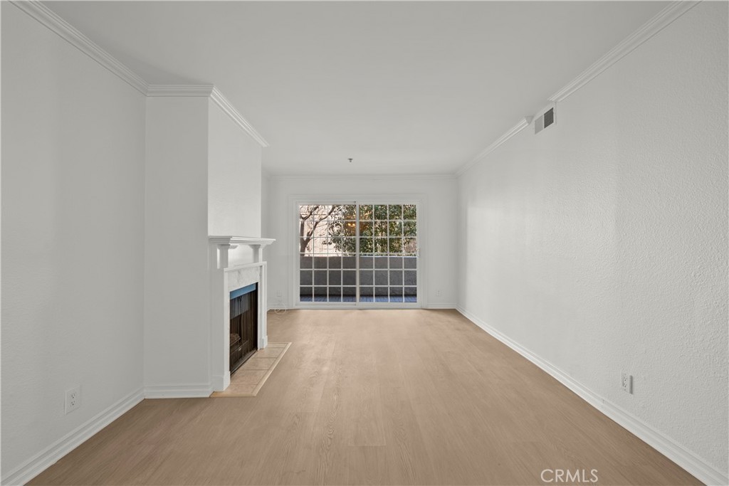 4401 Sepulveda Boulevard, Unit 107 Sherman Oaks, CA 91403 - Photo 12 of 25 an empty room with windows
