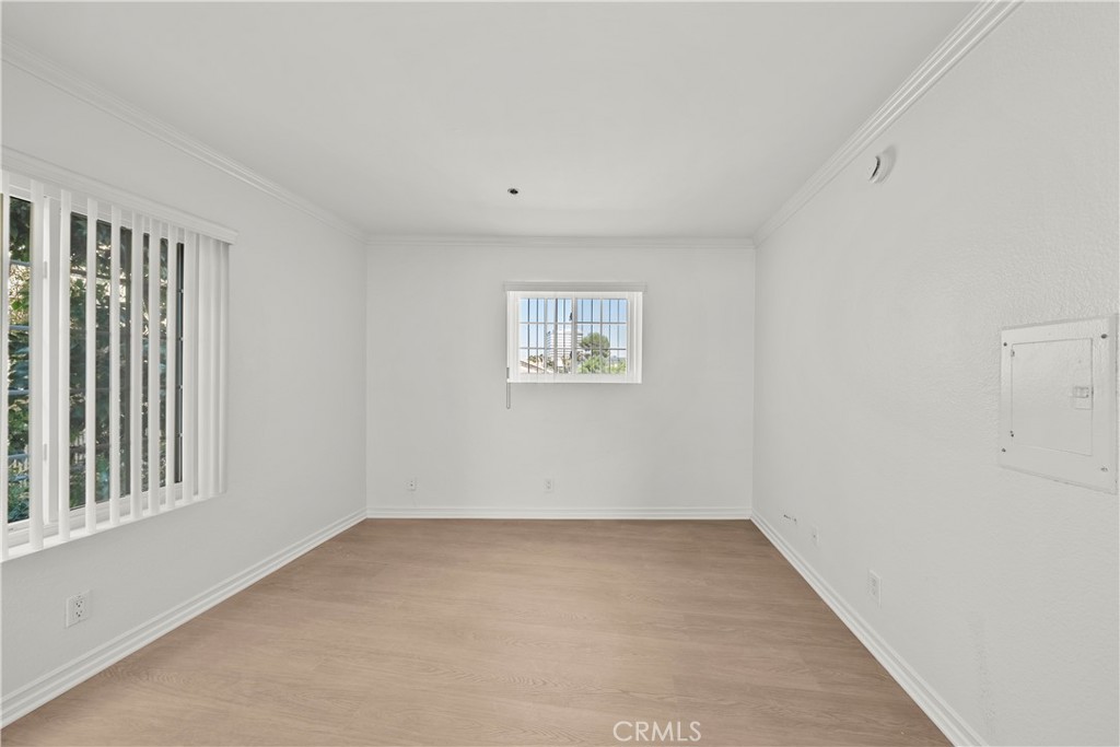 4401 Sepulveda Boulevard, Unit 107 Sherman Oaks, CA 91403 - Photo 16 of 25 an empty room with windows