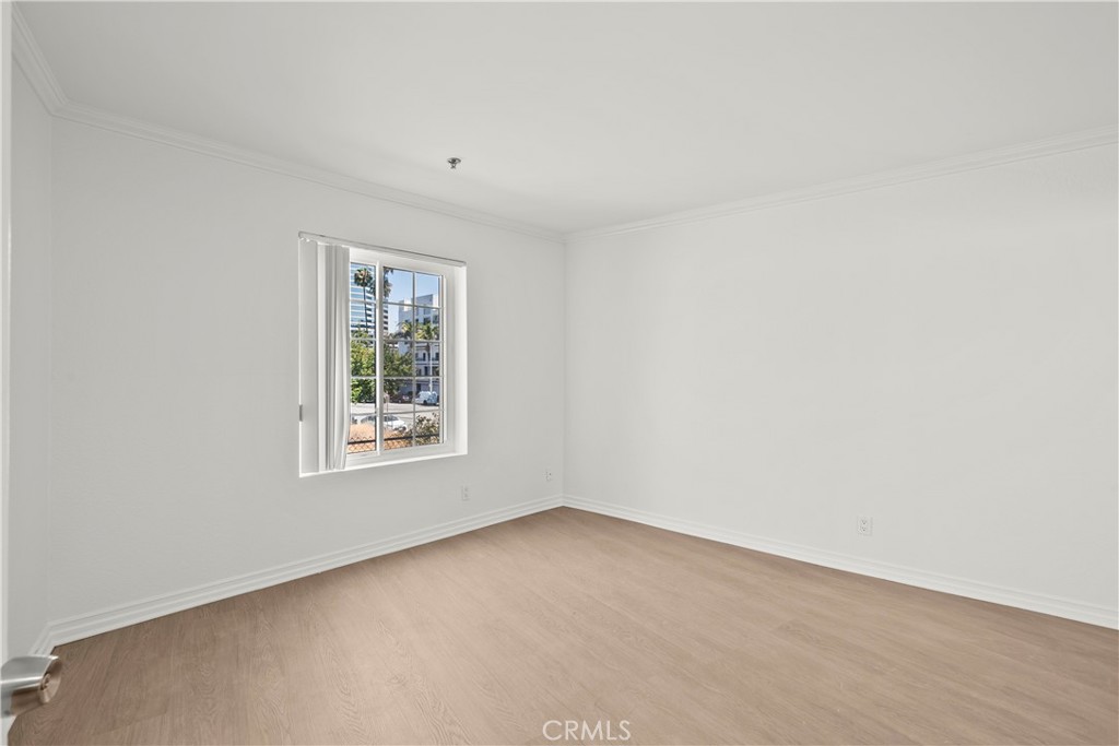 4401 Sepulveda Boulevard, Unit 107 Sherman Oaks, CA 91403 - Photo 19 of 25 an empty room with a window