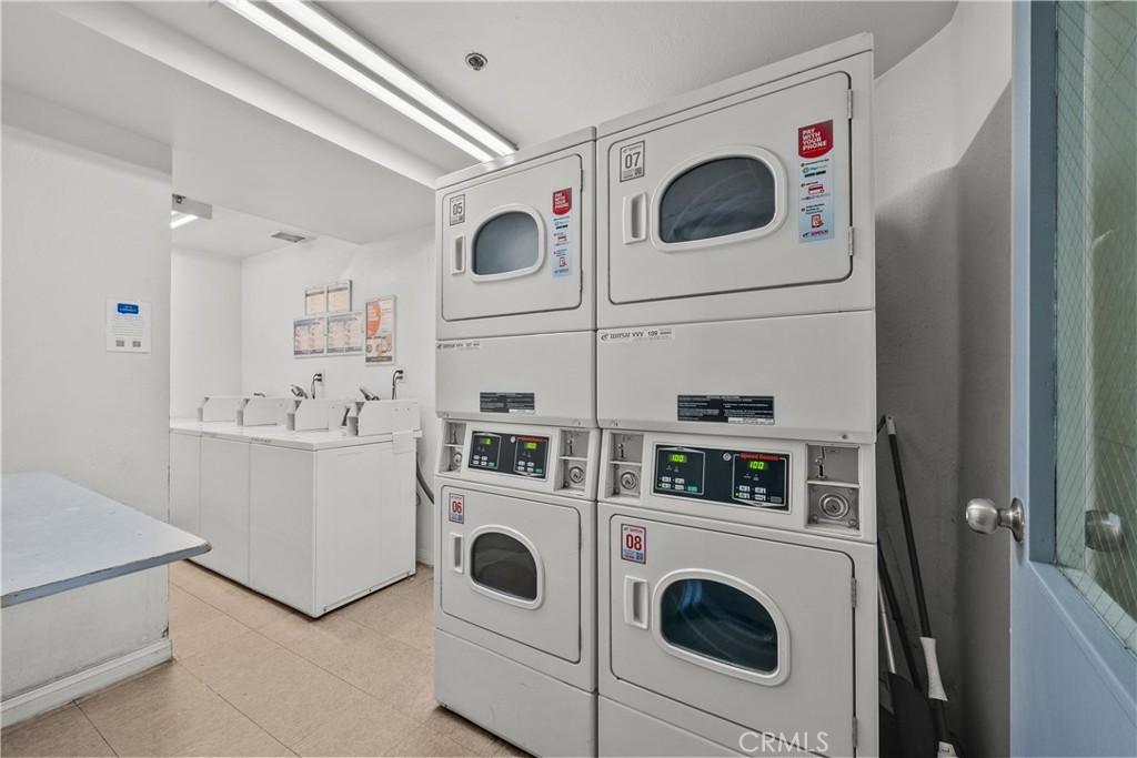 4401 Sepulveda Boulevard, Unit 107 Sherman Oaks, CA 91403 - Photo 24 of 25 a utility room with dryer and washer