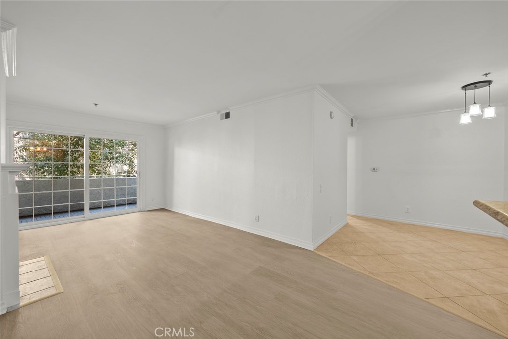 4401 Sepulveda Boulevard, Unit 107 Sherman Oaks, CA 91403 - Photo 5 of 25 a view of empty room with windows