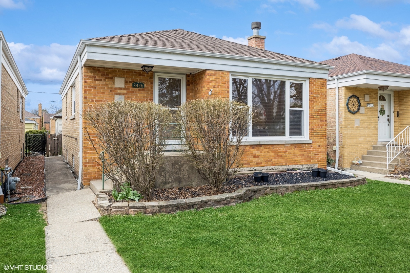 2426 Lathrop Avenue North Riverside, IL 60546 - Photo 1 of 12 a front view of a house with a yard