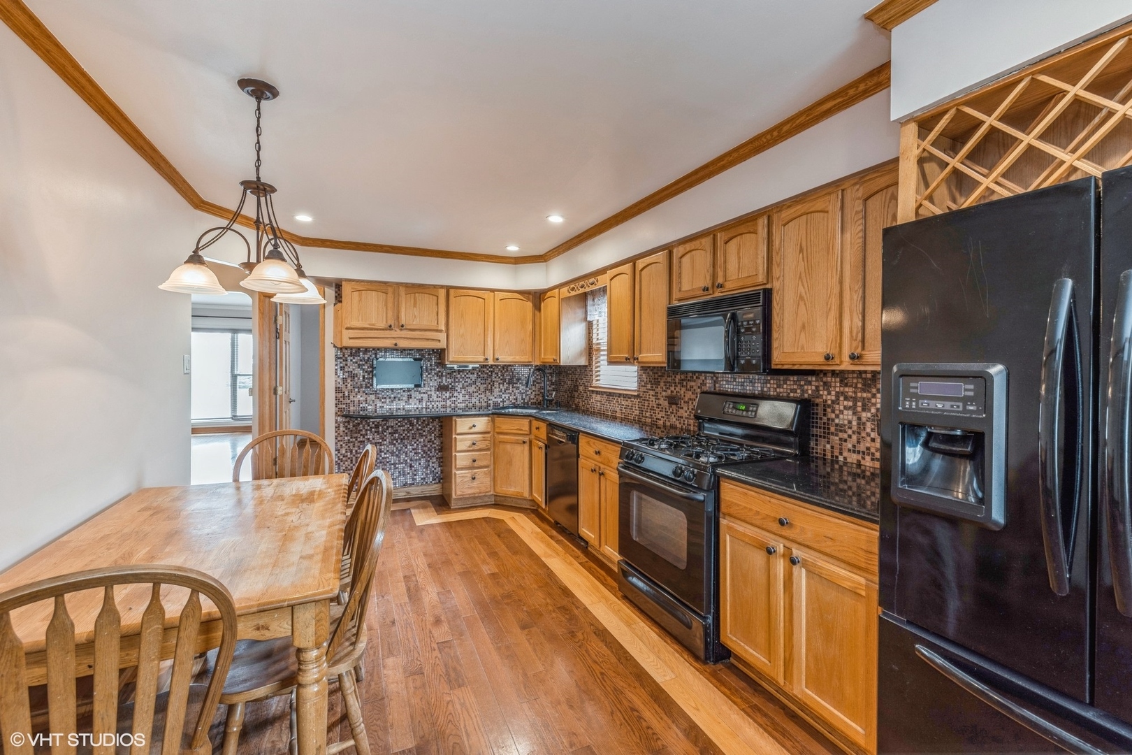 2426 Lathrop Avenue North Riverside, IL 60546 - Photo 4 of 12 a kitchen with stainless steel appliances granite countertop a refrigerator a stove top oven a sink and dishwasher