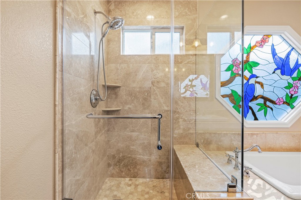 24123 Wildwood Canyon Road Newhall, CA 91321 - Photo 14 of 32 a bathroom with a shower