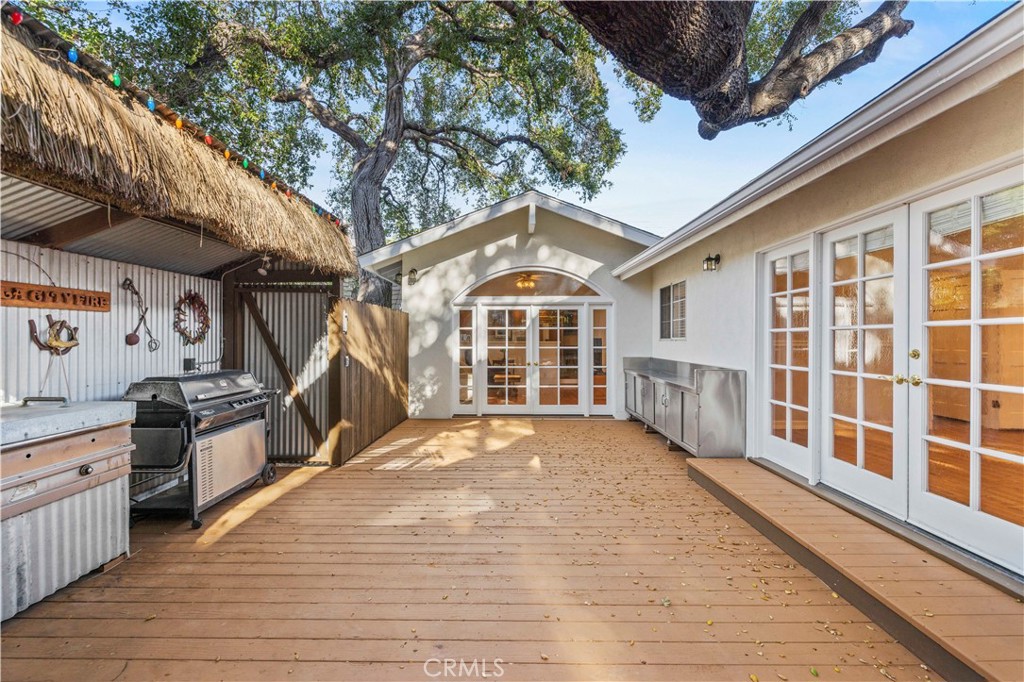 24123 Wildwood Canyon Road Newhall, CA 91321 - Photo 22 of 32 a view of a living room with a large window