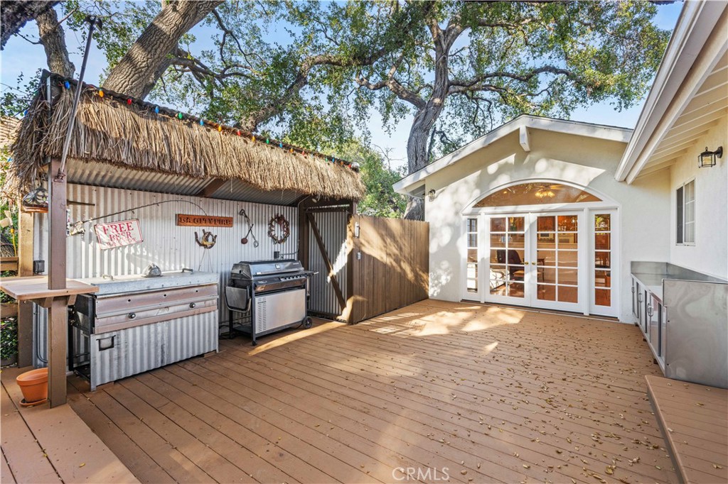 24123 Wildwood Canyon Road Newhall, CA 91321 - Photo 28 of 32 a view of a house with a balcony