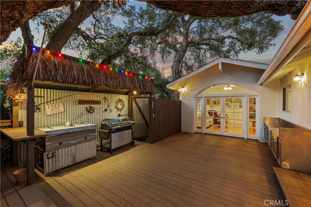 24123 Wildwood Canyon Road Newhall, CA 91321 - Photo 31 of 32 a view of a chairs and table in the patio