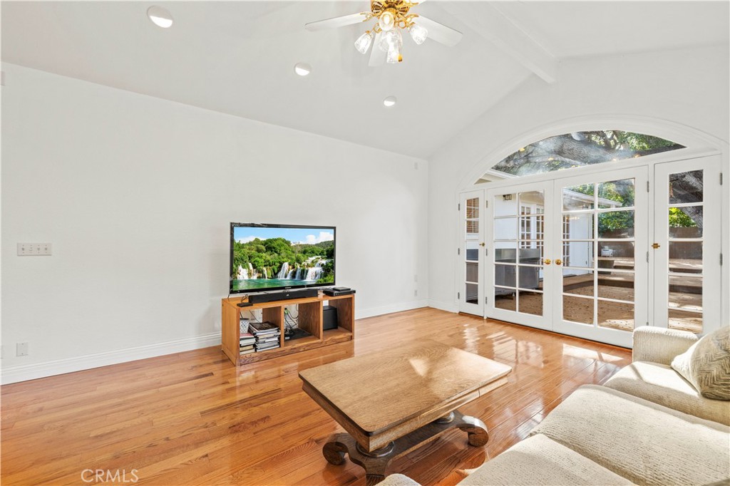 24123 Wildwood Canyon Road Newhall, CA 91321 - Photo 7 of 32 a living room with furniture pool table and a window