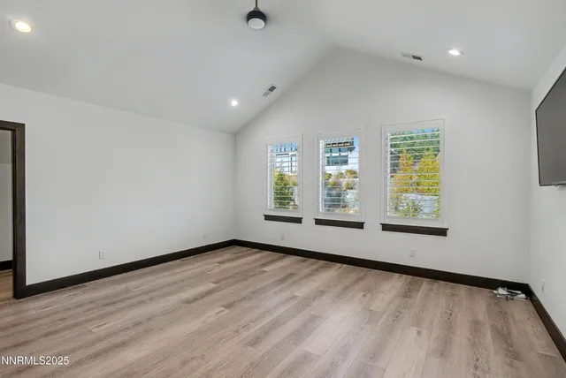 an empty room with windows