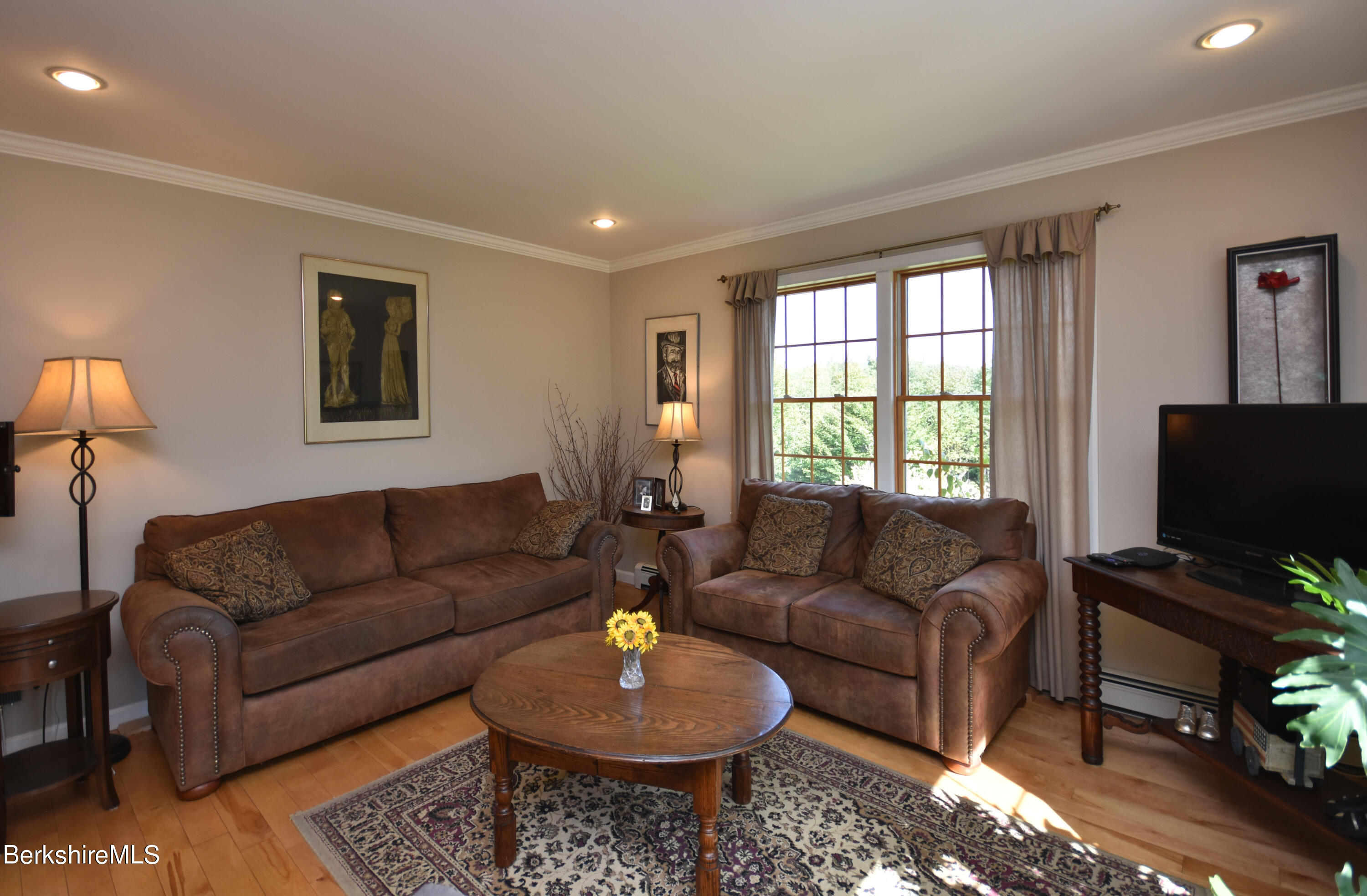 1540 East Windsor Road Windsor, MA 01270 - Photo 12 of 52 a living room with furniture and a flat screen tv