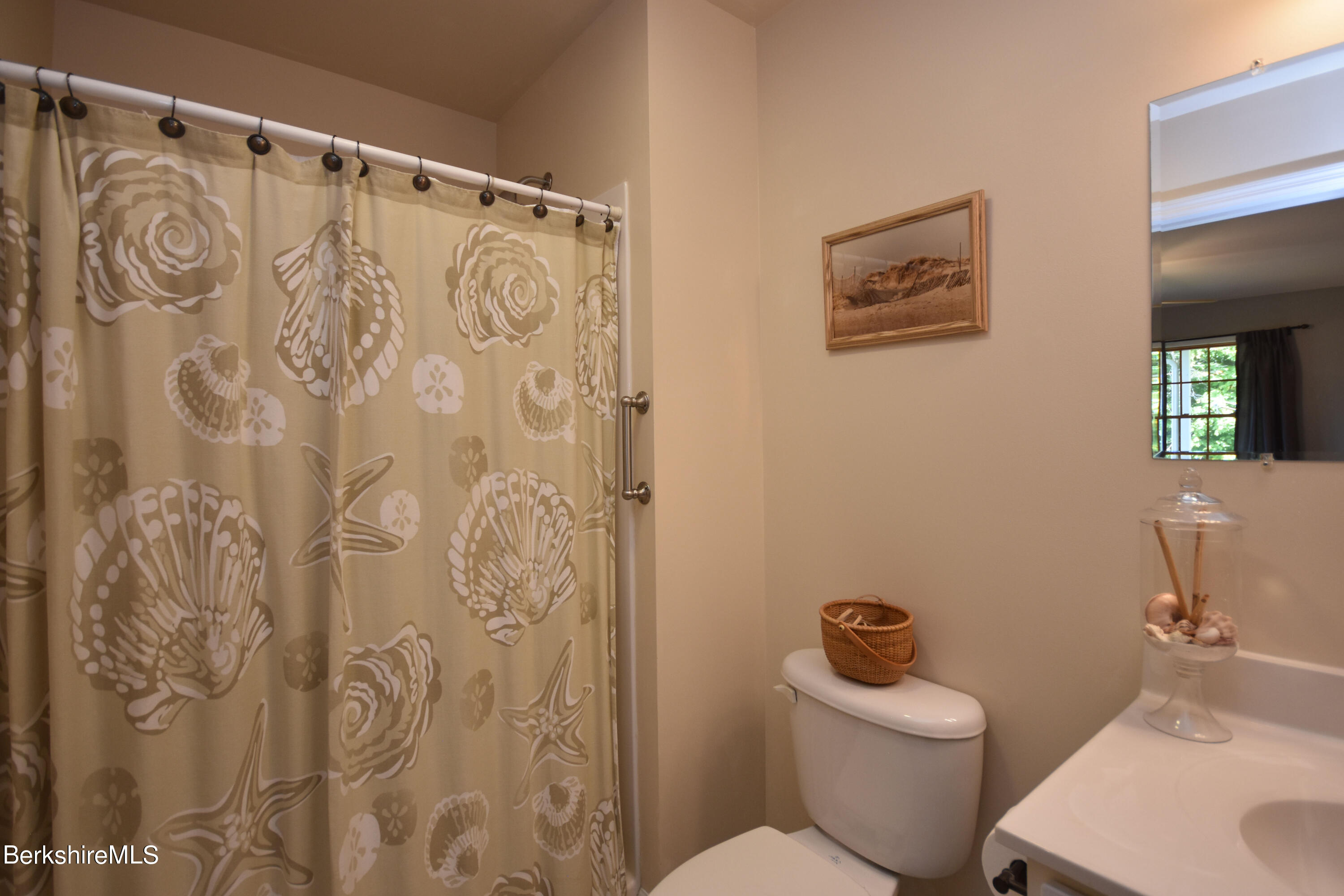 1540 East Windsor Road Windsor, MA 01270 - Photo 21 of 52 a white toilet sitting next to a bathroom sink