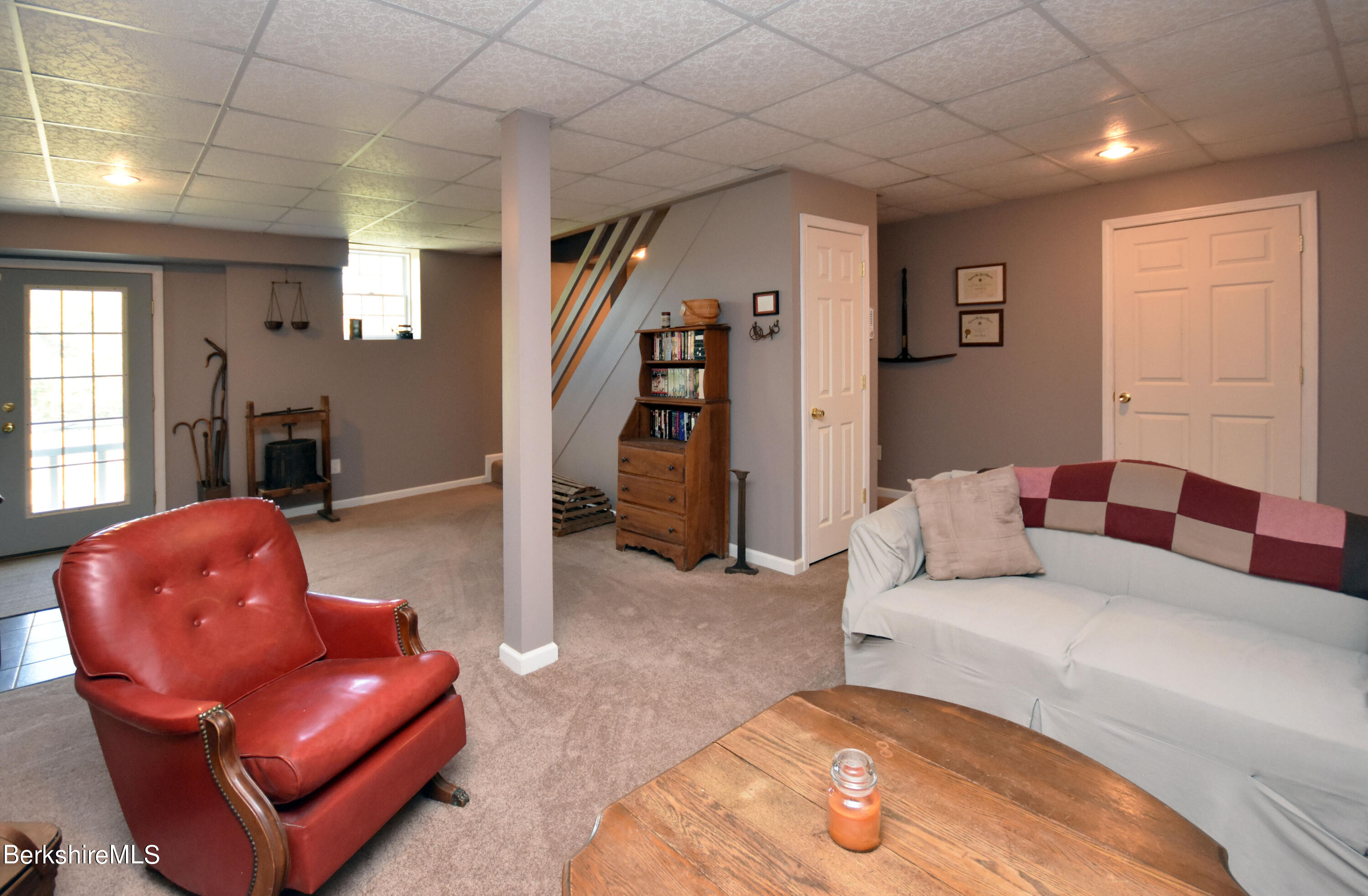 1540 East Windsor Road Windsor, MA 01270 - Photo 30 of 52 a living room with furniture and a gym machine