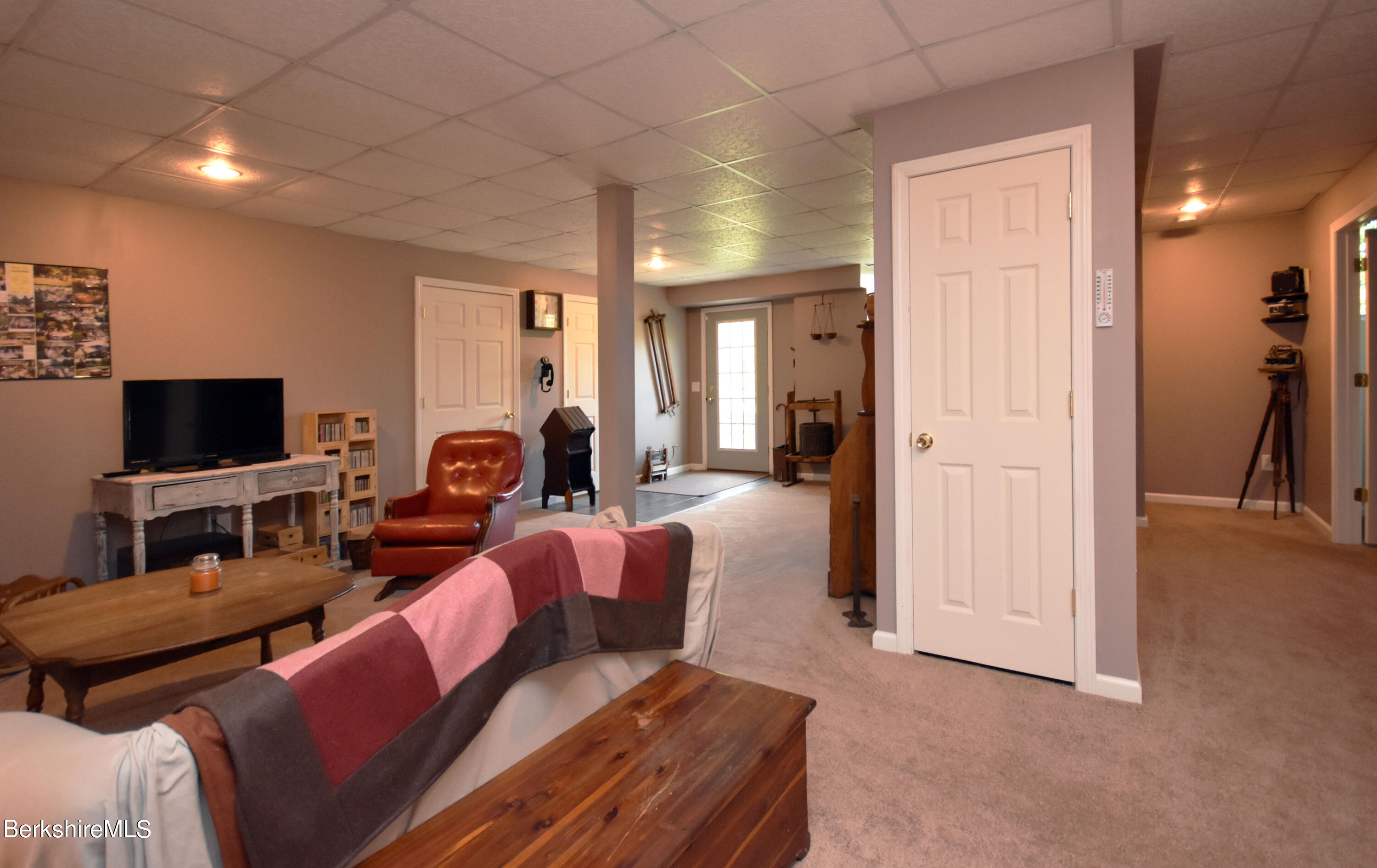 1540 East Windsor Road Windsor, MA 01270 - Photo 31 of 52 a living room with furniture and a flat screen tv