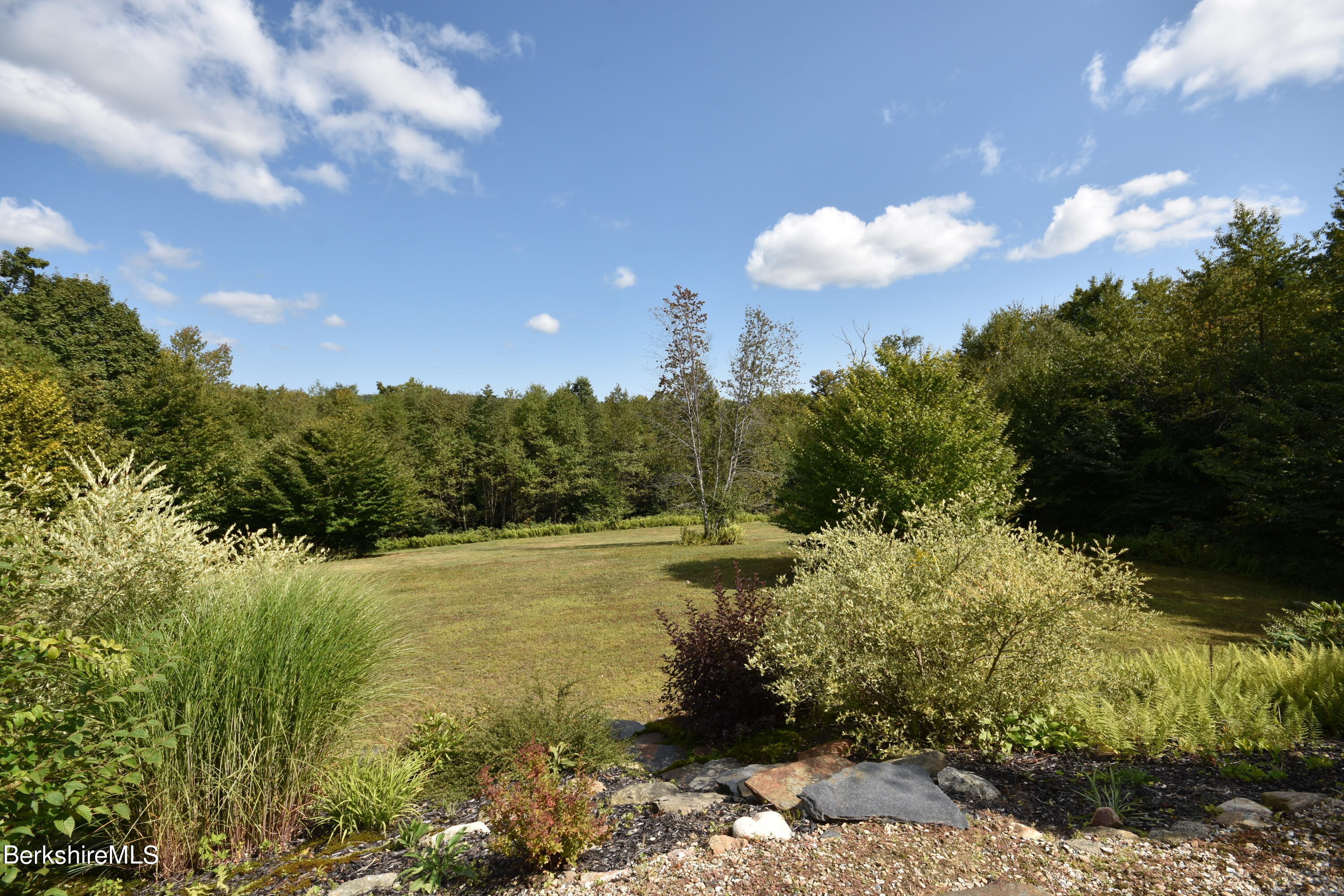 1540 East Windsor Road Windsor, MA 01270 - Photo 43 of 52 a view of a lake with a yard