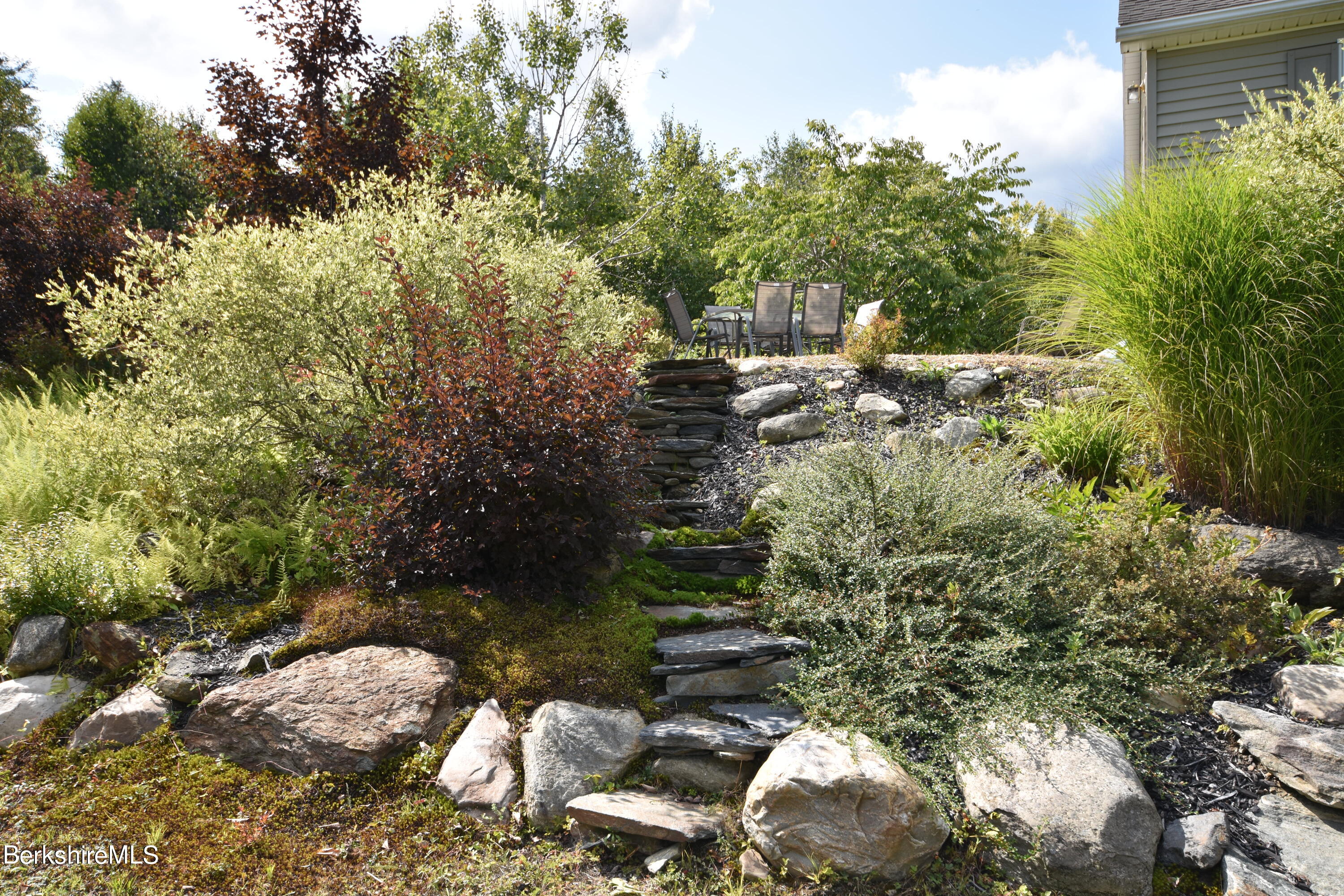 1540 East Windsor Road Windsor, MA 01270 - Photo 48 of 52 a backyard of a house with a yard with outdoor seating