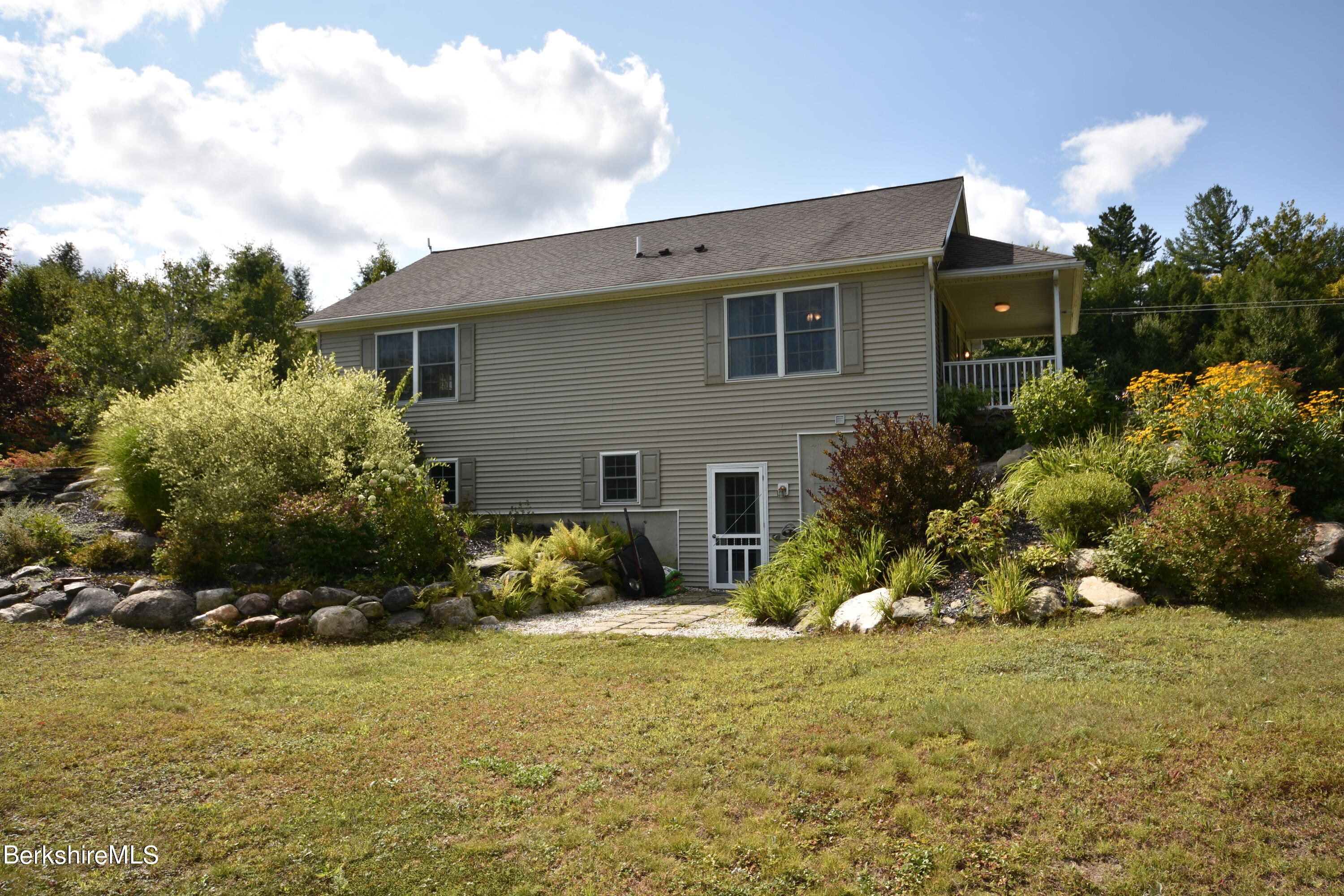 1540 East Windsor Road Windsor, MA 01270 - Photo 49 of 52 a view of a house with a yard