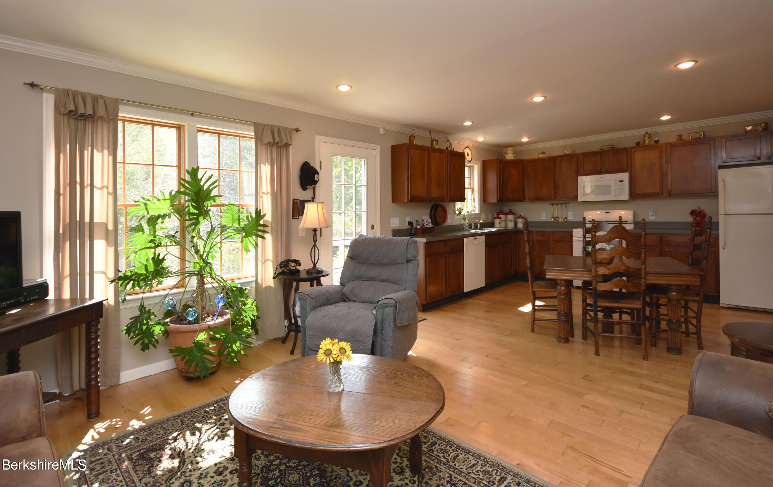 1540 East Windsor Road Windsor, MA 01270 - Photo 7 of 52 a living room with lots of furniture kitchen view and a large window