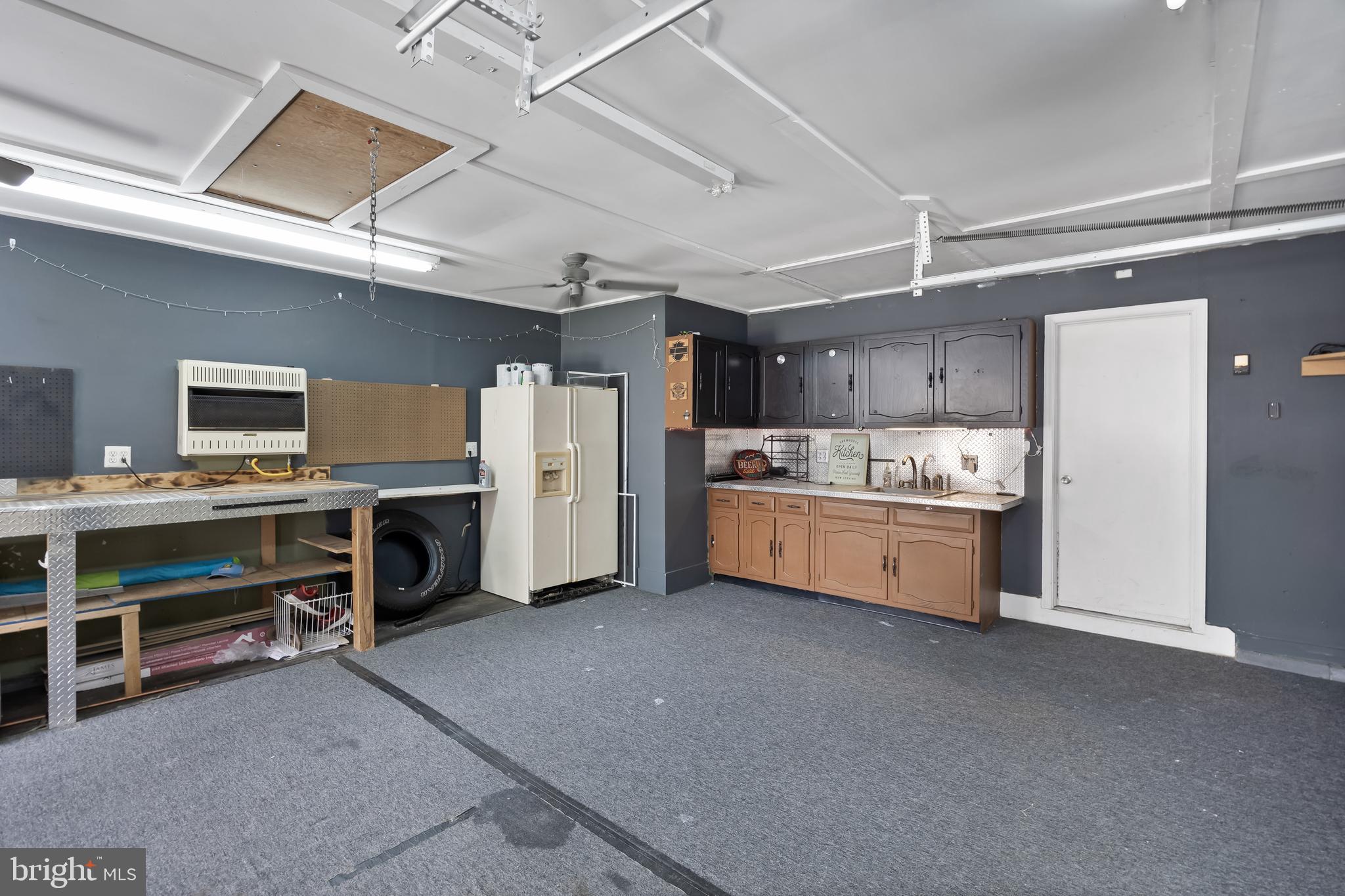 19 Draco Drive Sewell, NJ 08080 - Photo 19 of 34 a kitchen with refrigerator a stove and cabinets