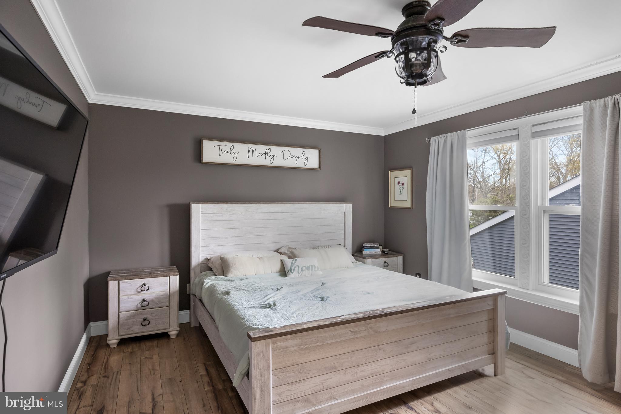 19 Draco Drive Sewell, NJ 08080 - Photo 21 of 34 a bedroom with a bed and wooden floor