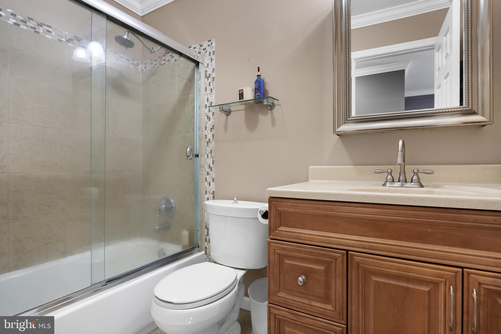 19 Draco Drive Sewell, NJ 08080 - Photo 24 of 34 a bathroom with a sink a toilet and a mirror