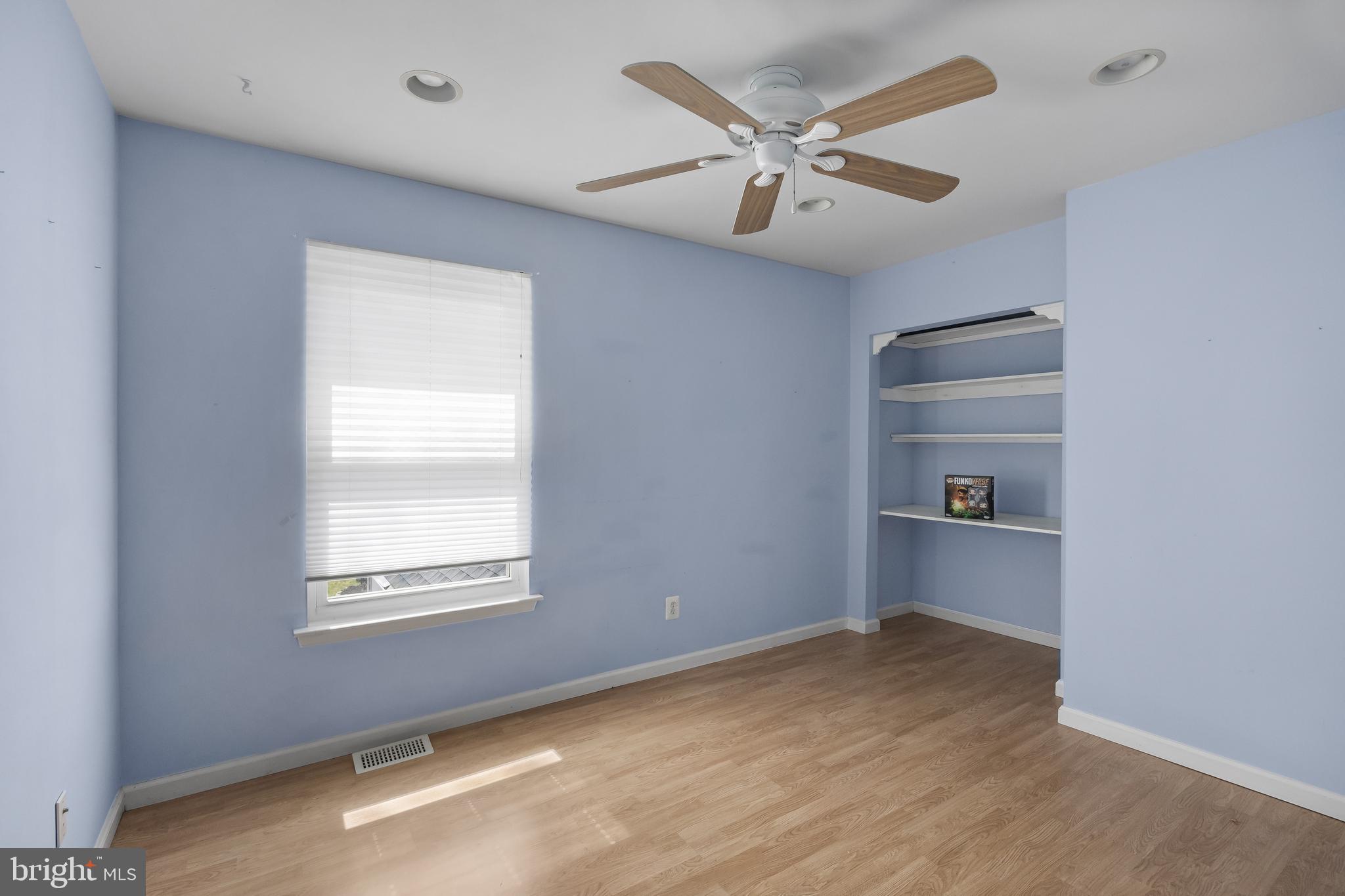 19 Draco Drive Sewell, NJ 08080 - Photo 28 of 34 a view of a livingroom with a ceiling fan & windows