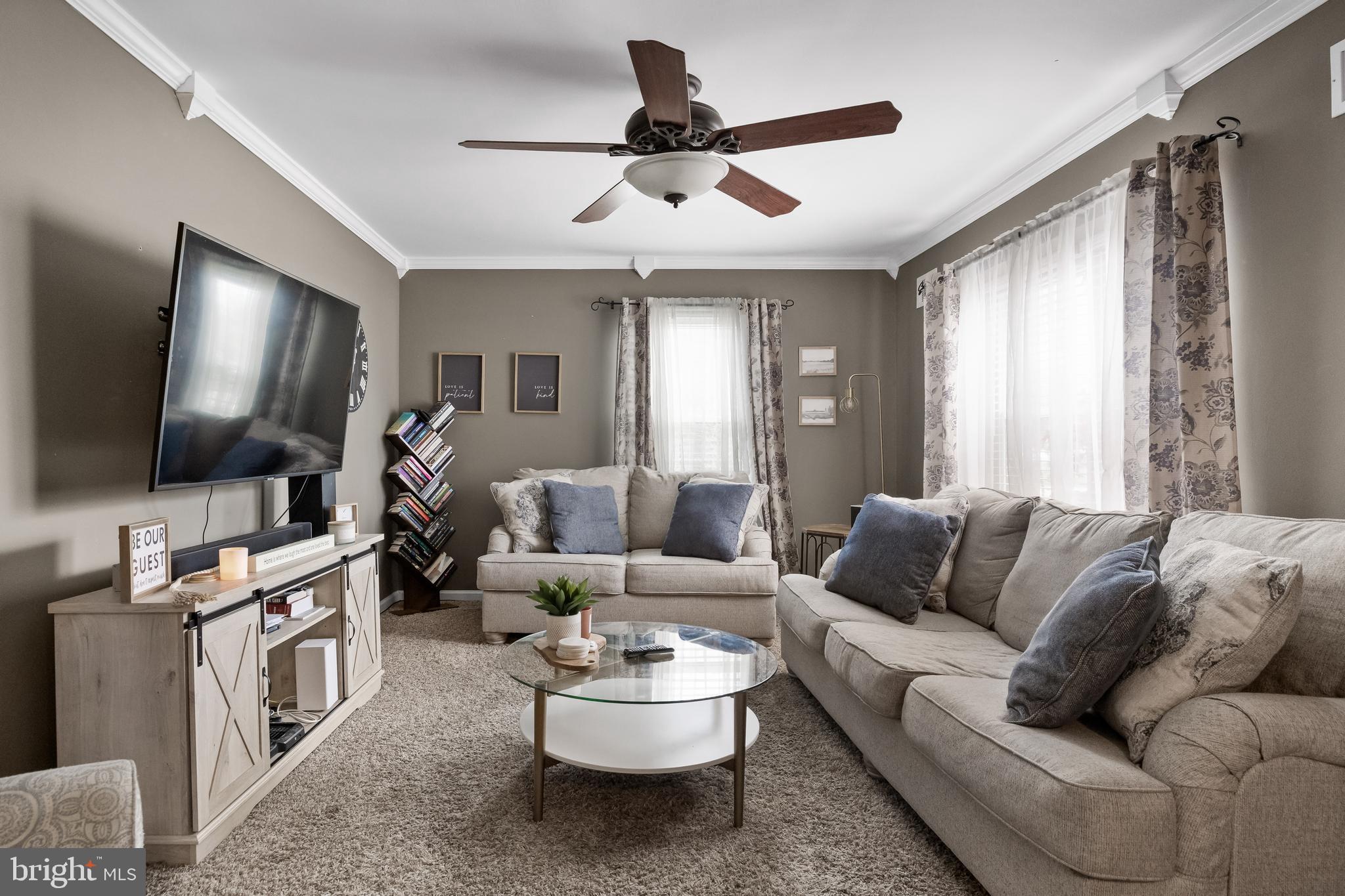 19 Draco Drive Sewell, NJ 08080 - Photo 5 of 34 a living room with furniture and a flat screen tv