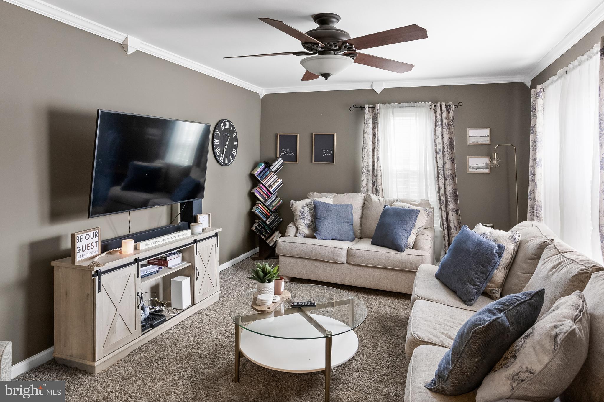 19 Draco Drive Sewell, NJ 08080 - Photo 6 of 34 a living room with furniture and a flat screen tv
