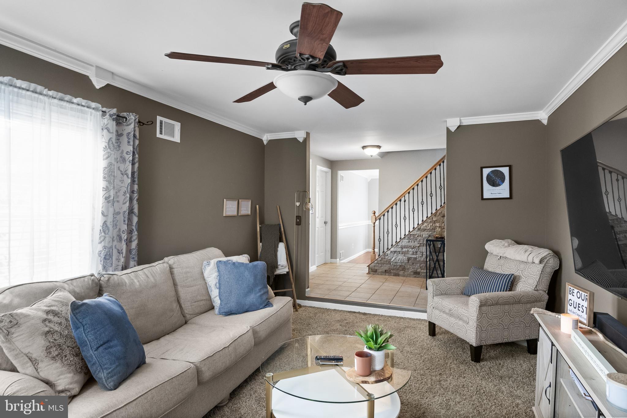 19 Draco Drive Sewell, NJ 08080 - Photo 7 of 34 a living room with furniture and a flat screen tv