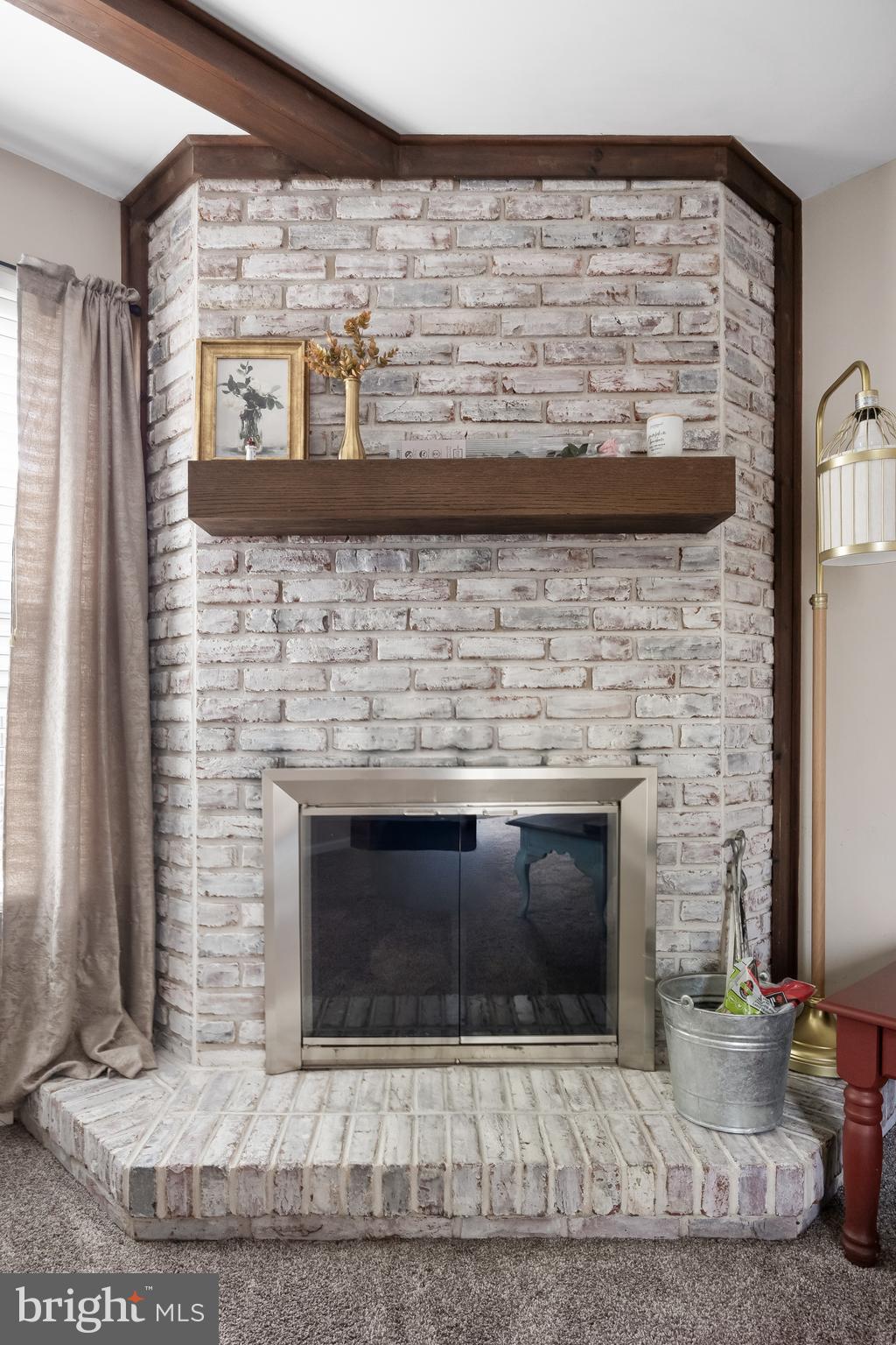 19 Draco Drive Sewell, NJ 08080 - Photo 10 of 34 a living room with a fireplace