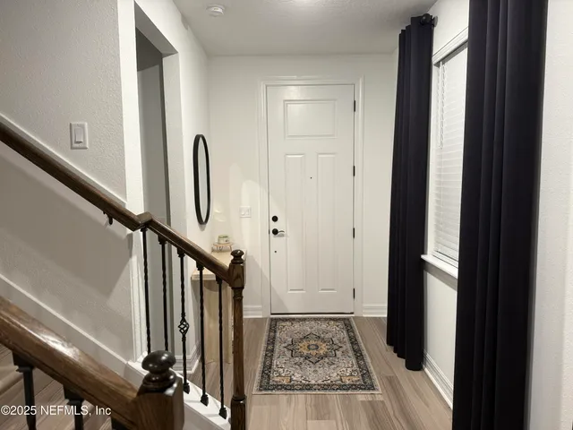 a view of an entryway with stairs