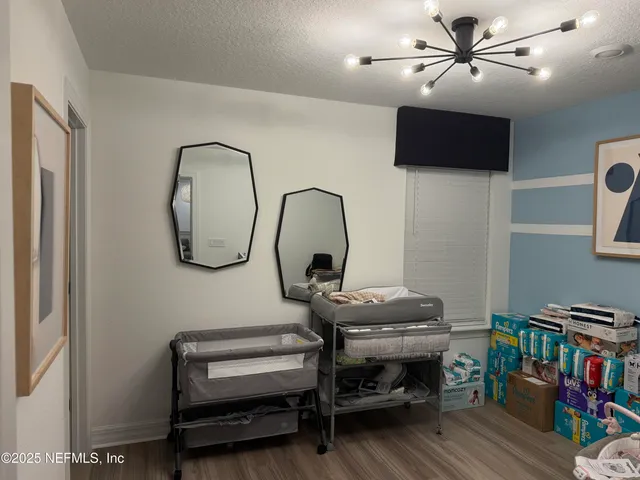 a view of a livingroom with furniture