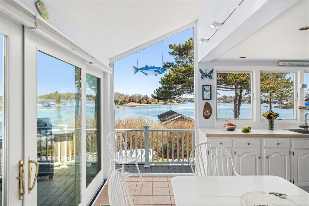 62 Crafts Road Gloucester, MA 01930 - Photo 15 of 40 a view of spacious bedroom with furniture and garden view