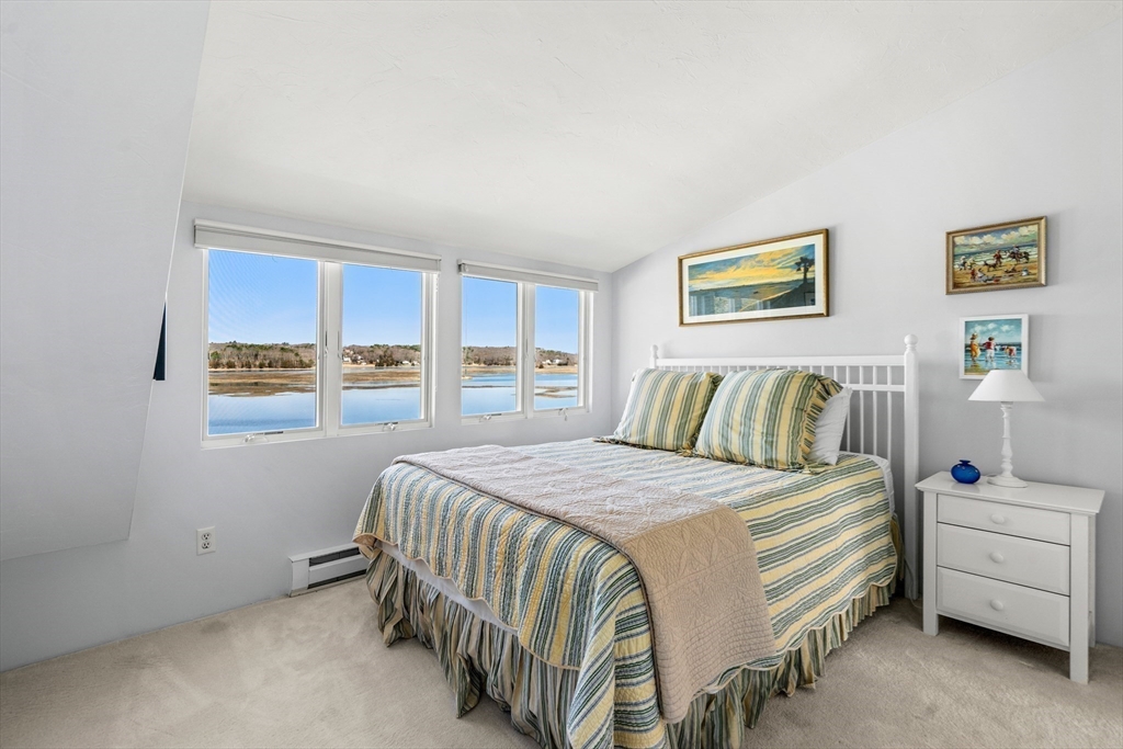 62 Crafts Road Gloucester, MA 01930 - Photo 23 of 40 a bedroom with a bed and a night stand