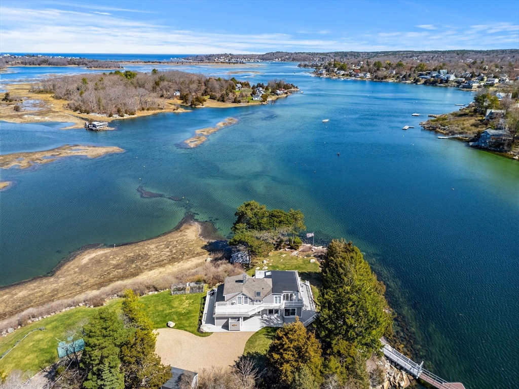 62 Crafts Road Gloucester, MA 01930 - Photo 3 of 40 a view of a lake with a mountain