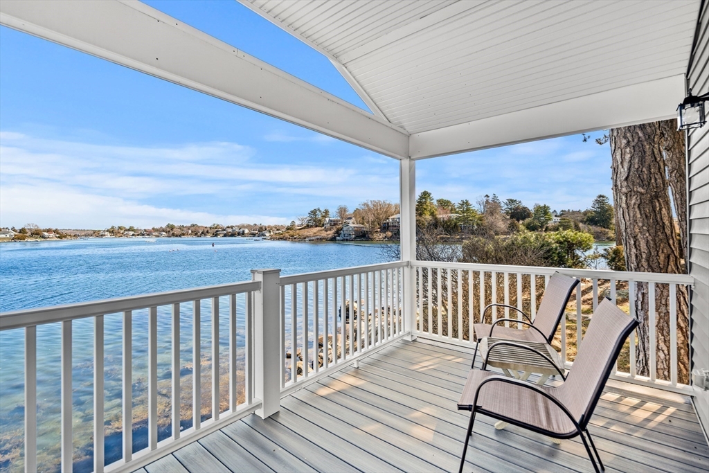 62 Crafts Road Gloucester, MA 01930 - Photo 34 of 40 a view of a two chairs in the balcony