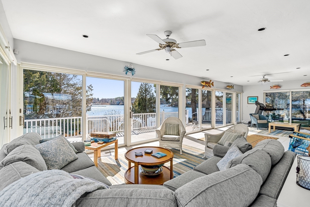 62 Crafts Road Gloucester, MA 01930 - Photo 9 of 40 a living room with furniture and a large window