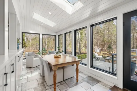 a view of entryway with livingroom and wooden floor