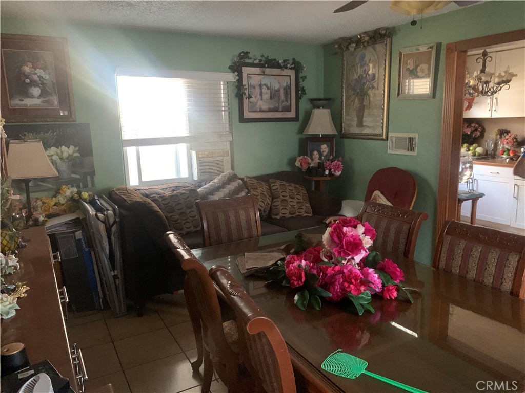 22414 Horst Avenue Hawaiian Gardens, CA 90716 - Photo 8 of 11 a bedroom with furniture and a window