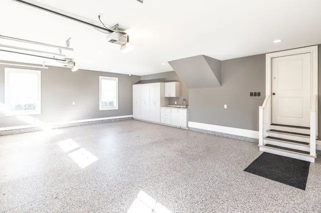 a living room with furniture fireplace and flat screen tv