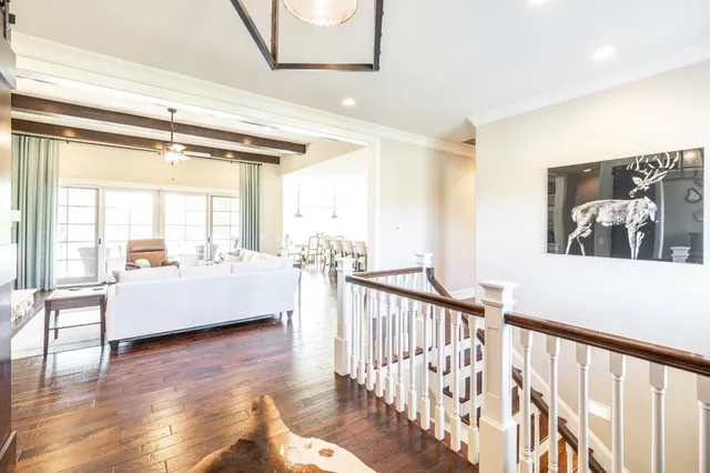 a kitchen with sink stove and cabinets