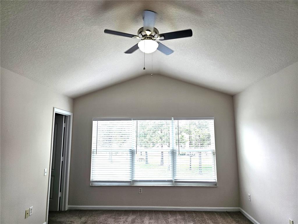 26638 Castleview Way Wesley Chapel, FL 33544 - Photo 12 of 24 a view of an empty room with a window