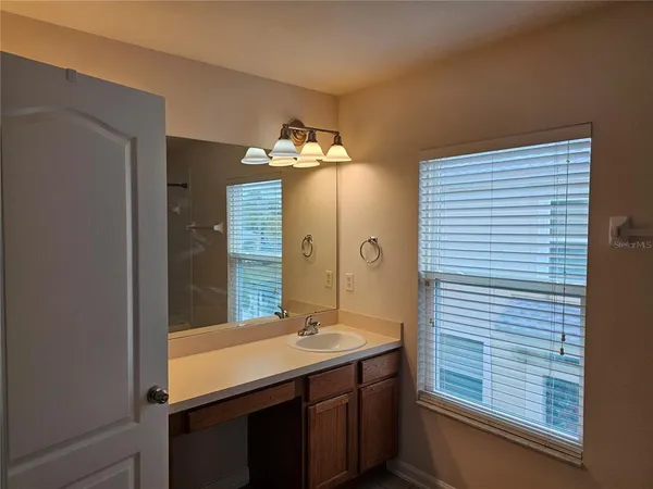 a bathroom with a tub and a shower
