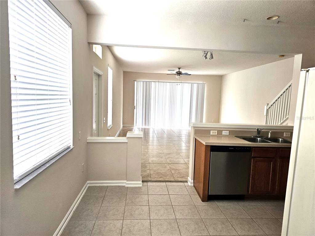 26638 Castleview Way Wesley Chapel, FL 33544 - Photo 5 of 24 a kitchen with stainless steel appliances granite countertop a stove and a sink