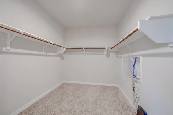 a view of a room with racks on the wall