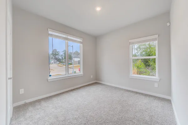 an empty room with windows