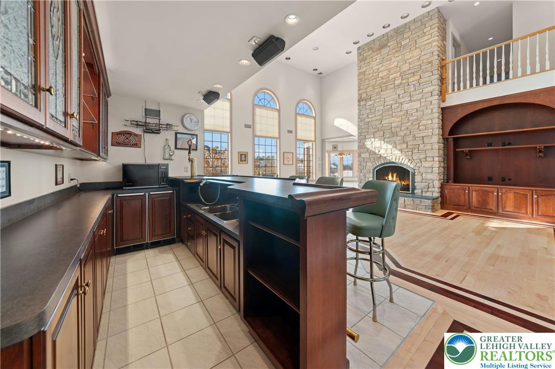 3640 Manor Road Bethlehem, PA 18020 - Photo 13 of 46 a kitchen with stainless steel appliances granite countertop a sink and a stove