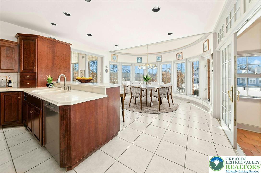 3640 Manor Road Bethlehem, PA 18020 - Photo 17 of 46 a large kitchen with stainless steel appliances granite countertop a sink and cabinets