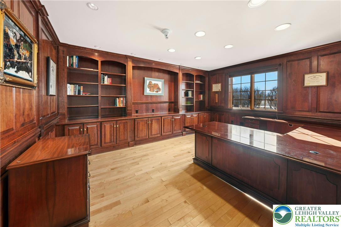 3640 Manor Road Bethlehem, PA 18020 - Photo 18 of 46 a large kitchen with stainless steel appliances a large counter top and a view of living room